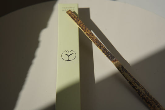 Lightweight bamboo matcha scoop by Yasumu, measuring 1g per portion, ideal for daily tea rituals